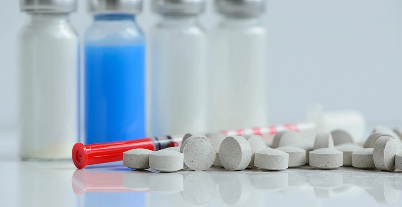 (portada) vial azul y blanco viales frasco frascos pastillas jeringa jeringuilla inyección
